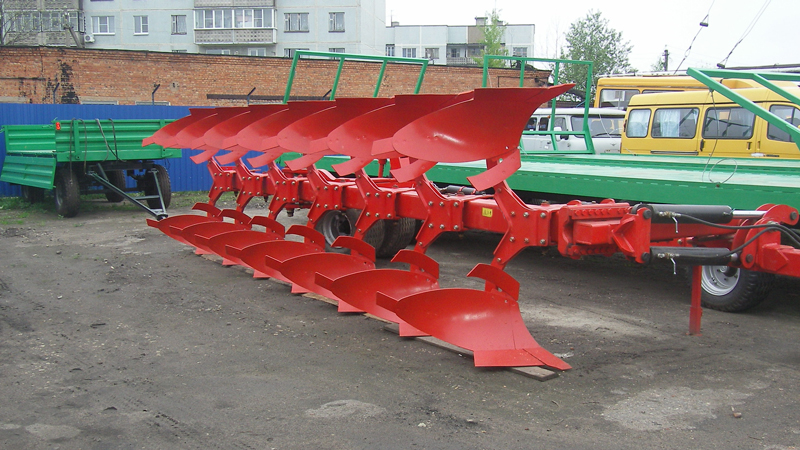 Плуги оборотні