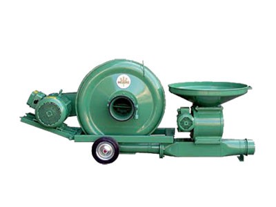 Нагнітаючий навантажувач з лопатевим шлюзом